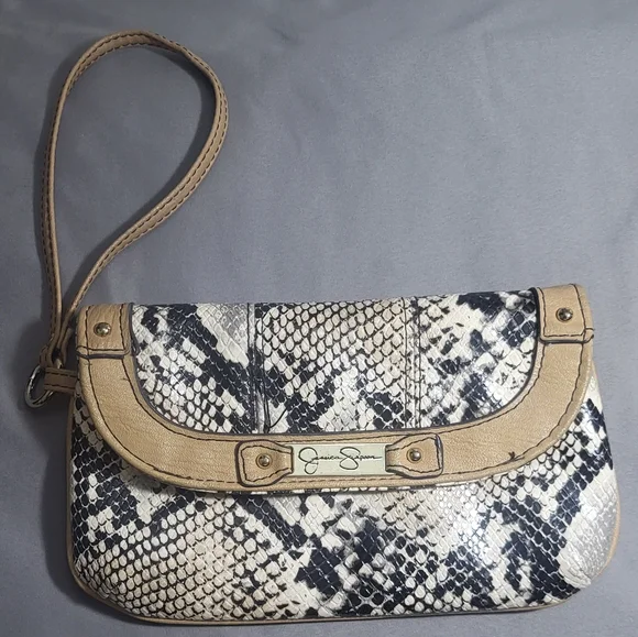 Jessica Simpson Black and Tan Snakeskin Clutch with Chic Design. - Picture 1 of 3